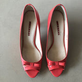 PRADA Peep-Toe Pumps